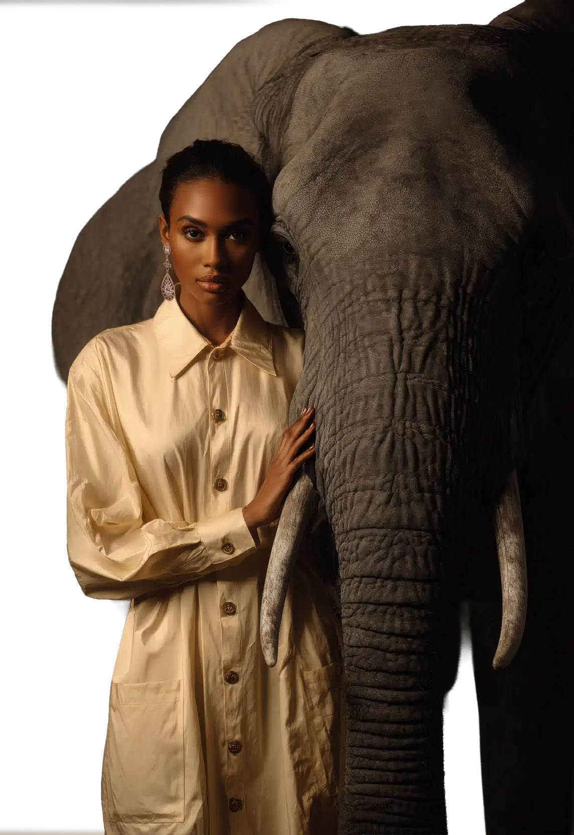 Mujer con vestido beige junto a un elefante africano — Lester Colchones